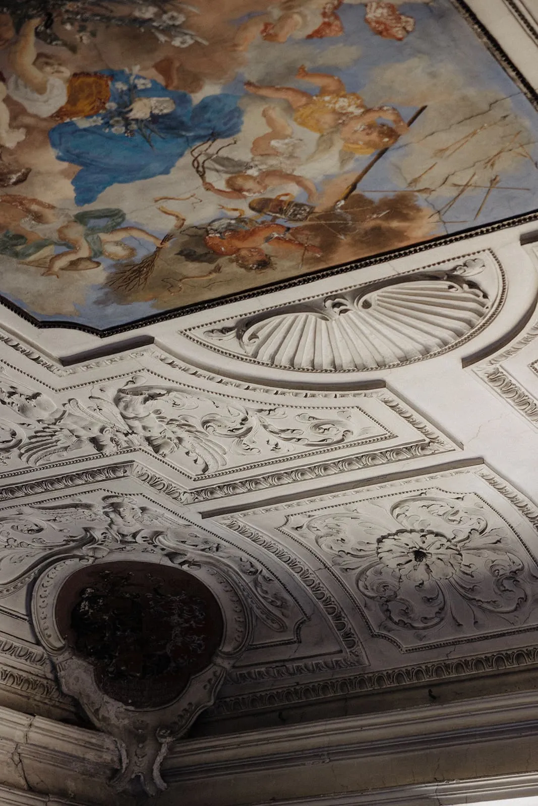 The painted ceiling and its stucco, seen from below